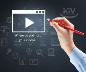 Text, "Where do you host your videos?" hand with red pencil pushing play on icon
