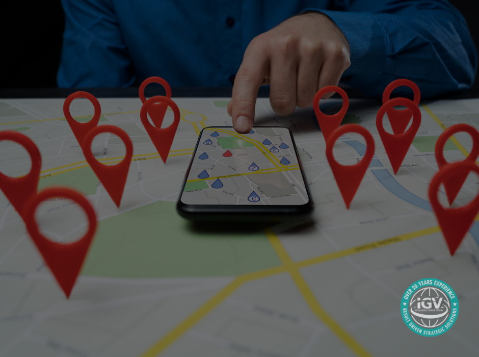 Smartphone on a map surrounded by location pins.